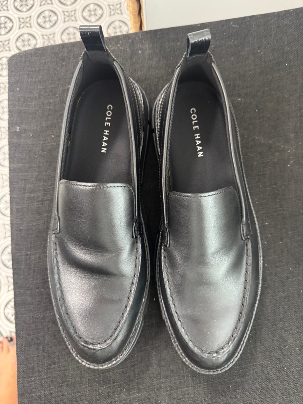 Cole Haan Black Leather Slip-On Loafers with Pull Tabs.140 on there web site